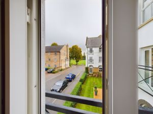 VIEW FROM LIVING ROOM TO THE VILLAGE GREEN- click for photo gallery